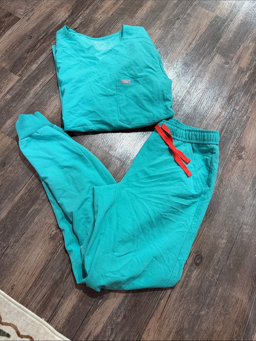 Figs Teal scrub set Jogger Pants and top with Red Drawstring